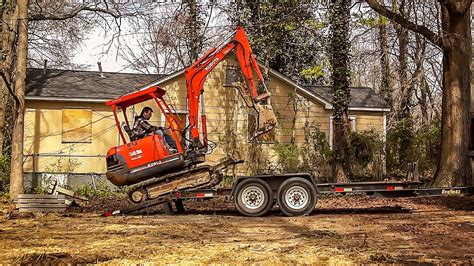 mini excavator trailer setup|loading mini excavator on trailer.